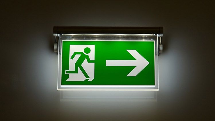 Illuminated emergency exit sign