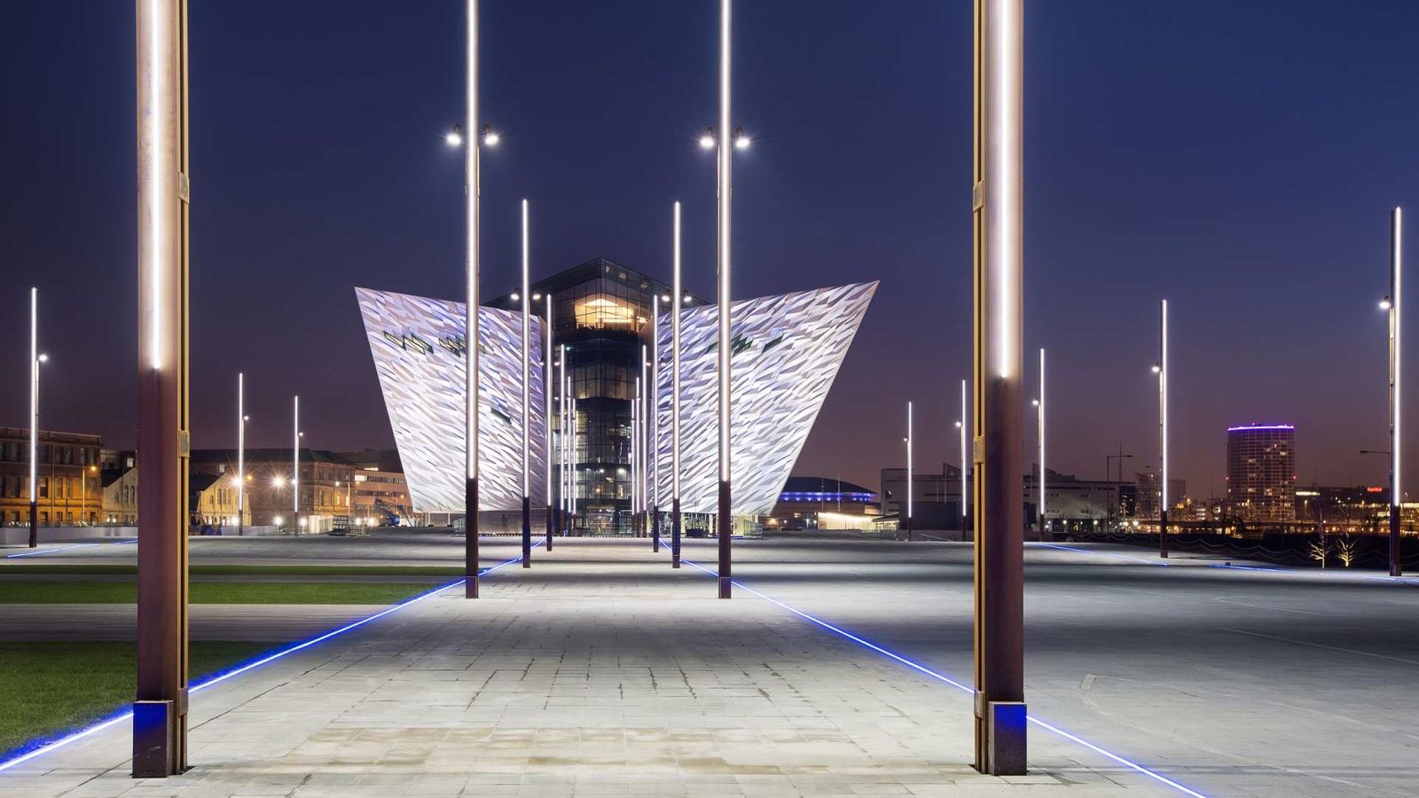 Titanic Belfast and the illuminated Titanic Slipways at night